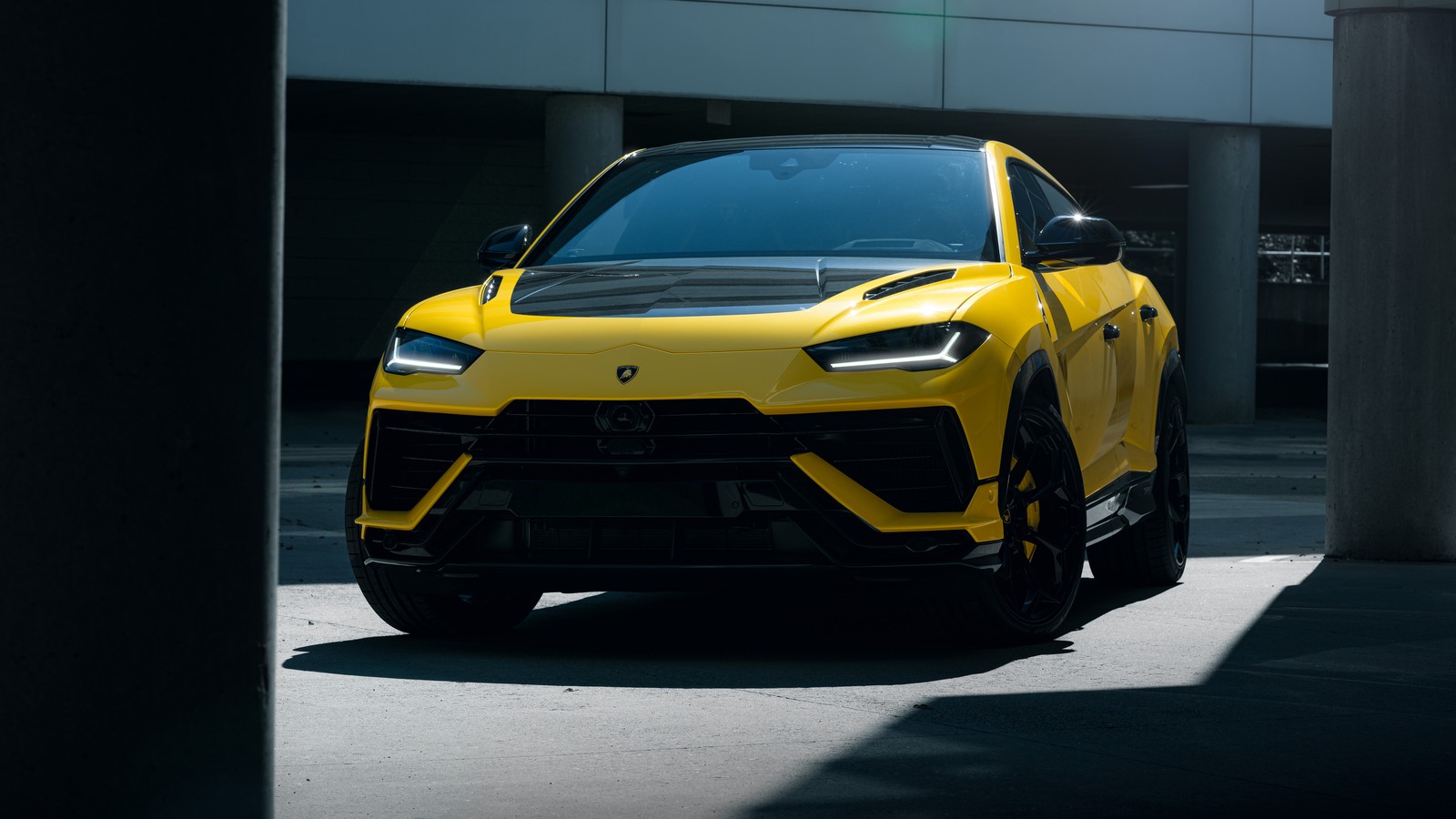 A yellow lamb suv parked in front of a building (lamborghini urus performante, super sports suv, 5k, 8k, cars)