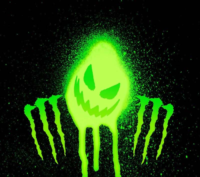 Крупный план банки monster energy с светящимся лицом (энергия, логотип, монстр)