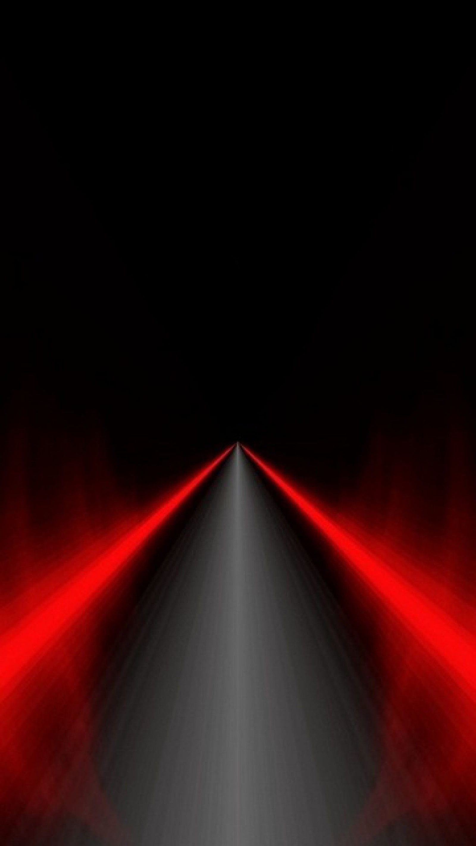 A close up of a red light on a black background (abstract, lines, road)