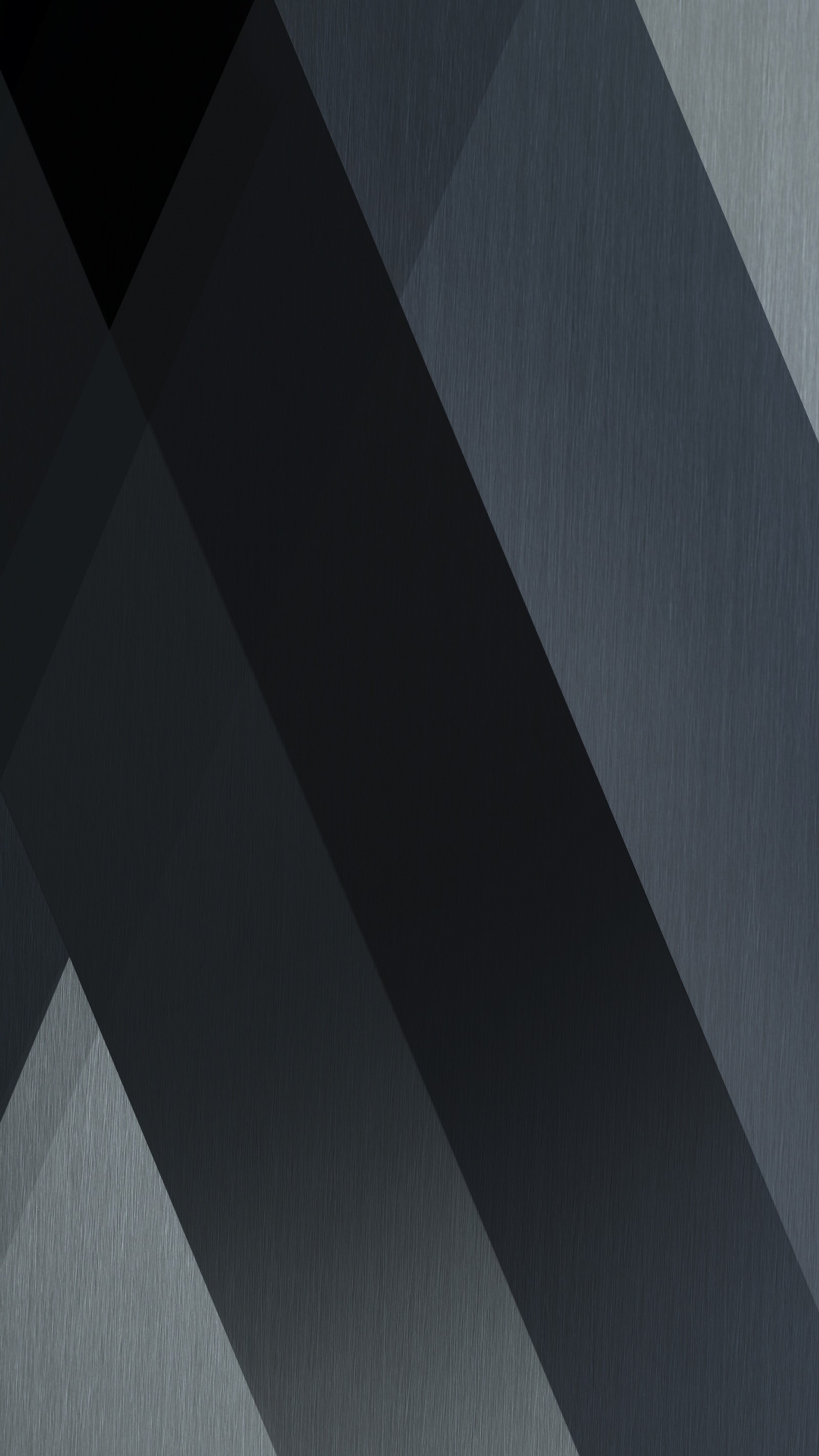 A close up of a black and grey wall with a diagonal pattern (abstract, black, graphic, lg v20 stock wallpaper)