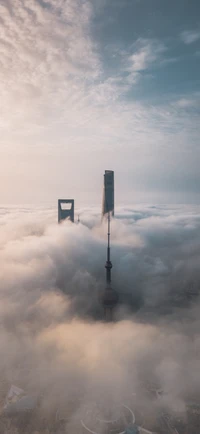 Shanghai Skyline Emerging from Cumulus Clouds