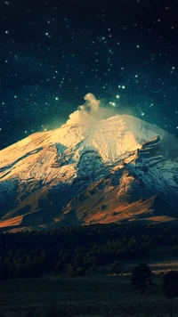 Majestic Snow-Capped Volcano Under Starry Sky