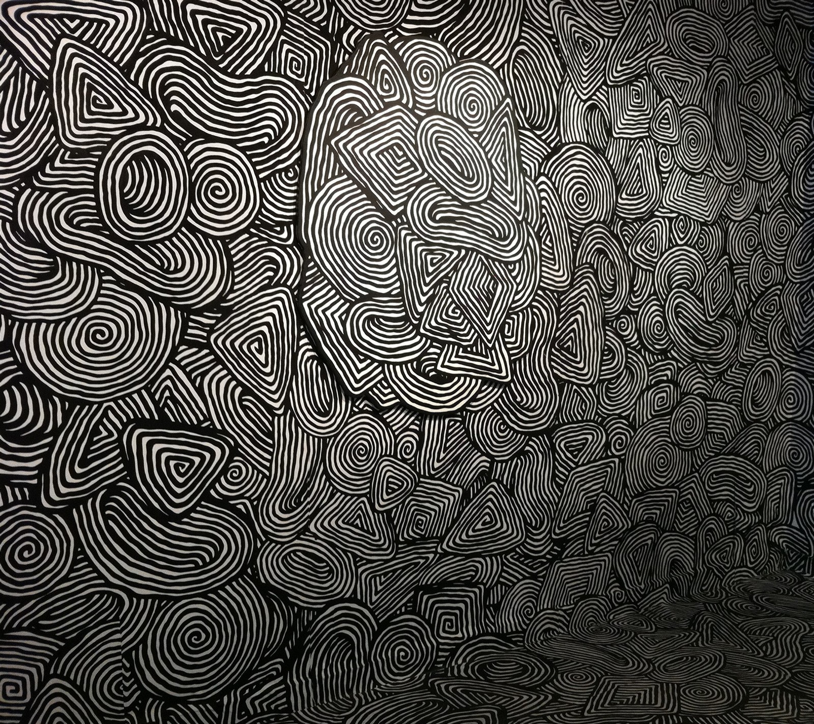 A close up of a wall with a pattern on it (cool, patterns, wallpaper)