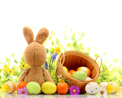 Lapin de printemps joyeux avec des œufs de Pâques colorés et des fleurs