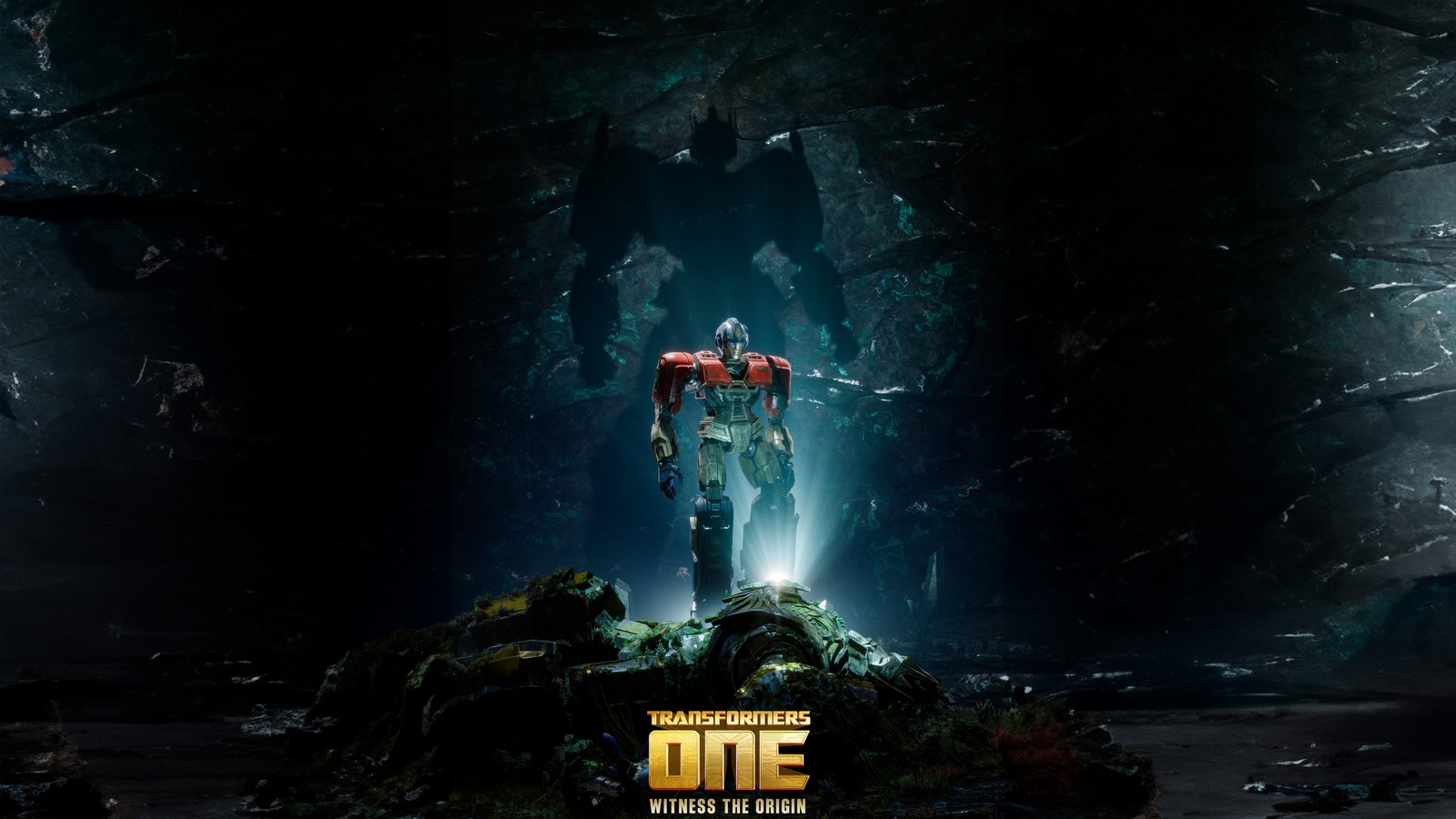 Un homme debout sur un rocher dans une grotte (orion pax optimus prime, transformers un, transformers one, films de 2024, 5k)