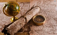 Explorer le monde : globe, boussole et carte antique