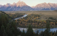 Serenidad Otoñal: Una Majestuosa Reflexión de Montañas y Bosques en un Paisaje de Parque Nacional