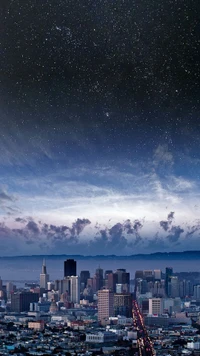 City Skyline Under a Starry Night Sky