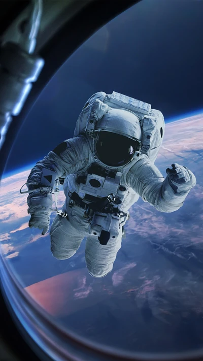 Astronaut in space, overlooking Earth from a spacecraft.