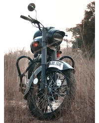 Classic Royal Enfield 350 Against a Natural Landscape