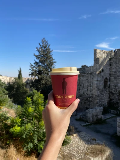 Morning Coffee with a Scenic View of Ancient Walls