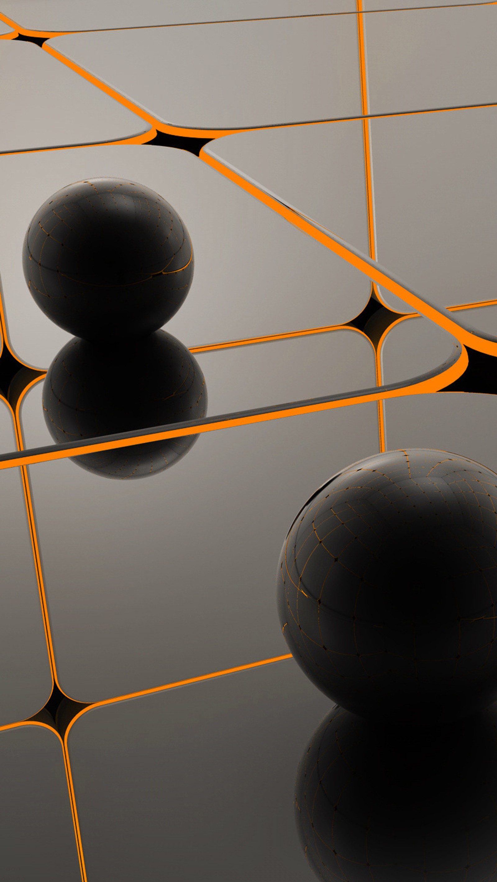 There are two spheres that are sitting on a reflective surface (balls, black, glass, orange, silver)