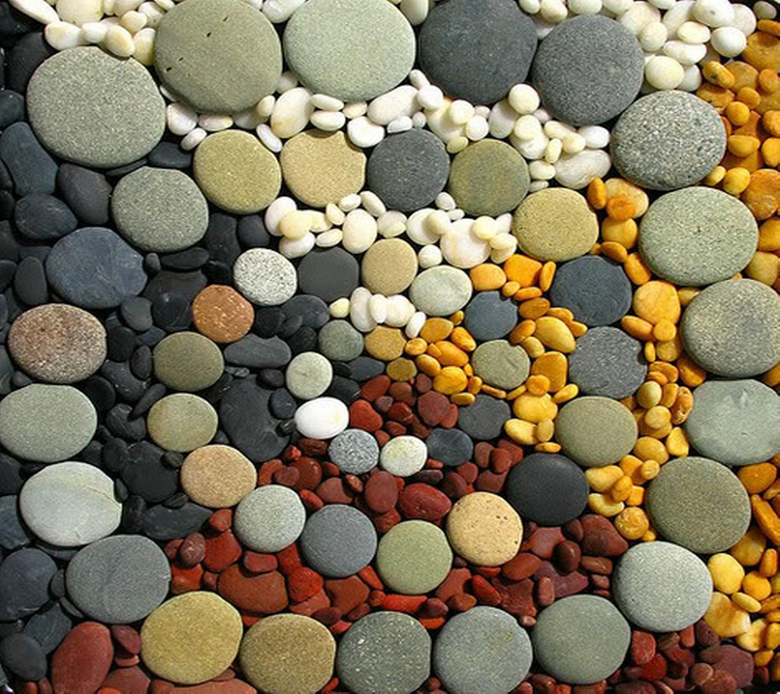 Arafed image of a variety of rocks and pebbles (colors, other, stones)