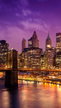 Pôr do sol sobre a Ponte do Brooklyn com o horizonte de Manhattan