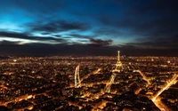 Nighttime Skyline of Paris with the Illuminated Eiffel Tower