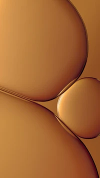 Abstract close-up of smooth, rounded shapes in brown and peach tones, reminiscent of modern smartphone design.