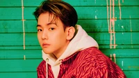 Baekhyun Radiates Charm Against a Vibrant Backdrop