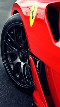 Striking Red Ferrari with Sleek Black Rims