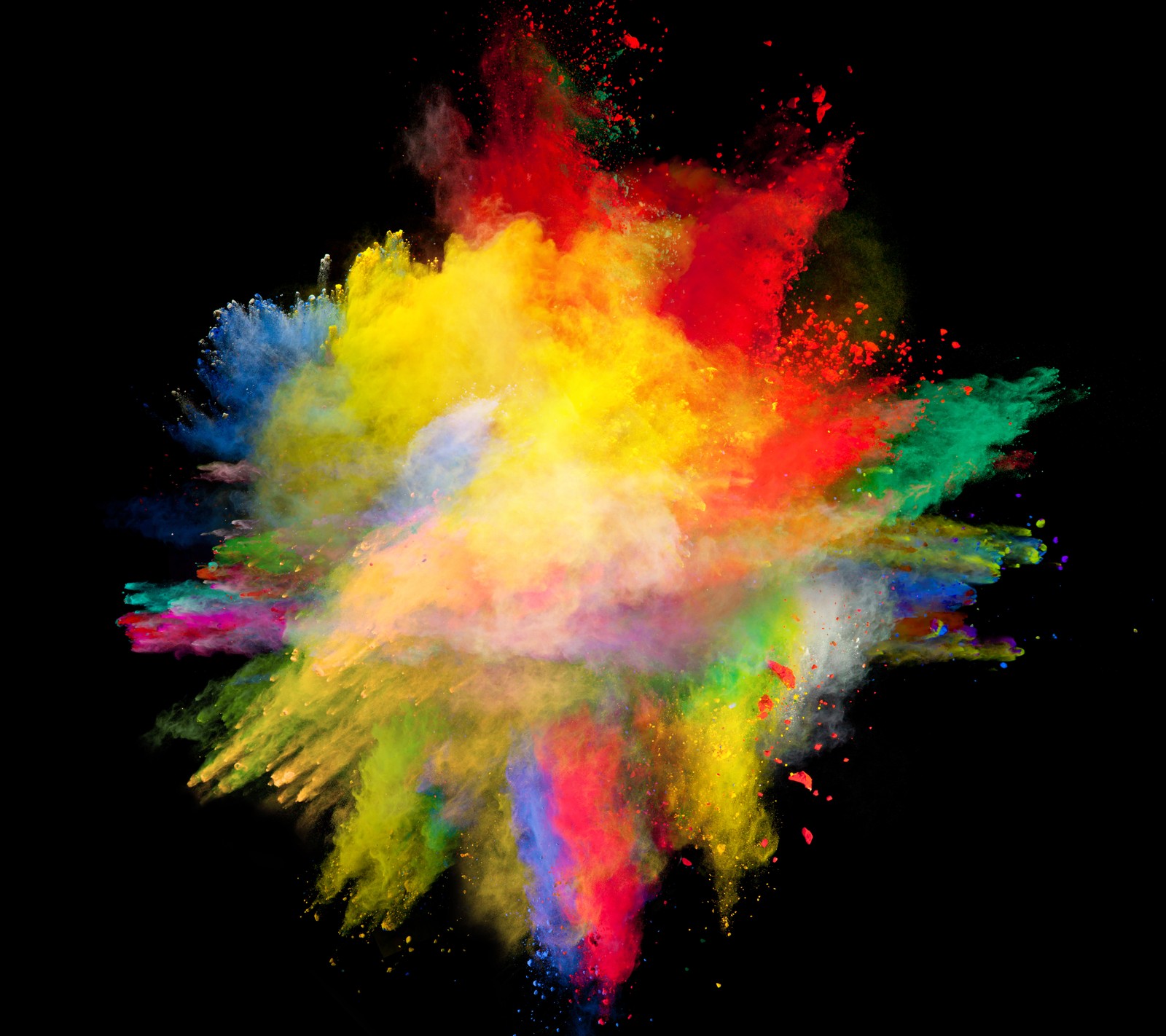 A close up of a colorful powder explosion on a black background (bomb, colors, explosion)