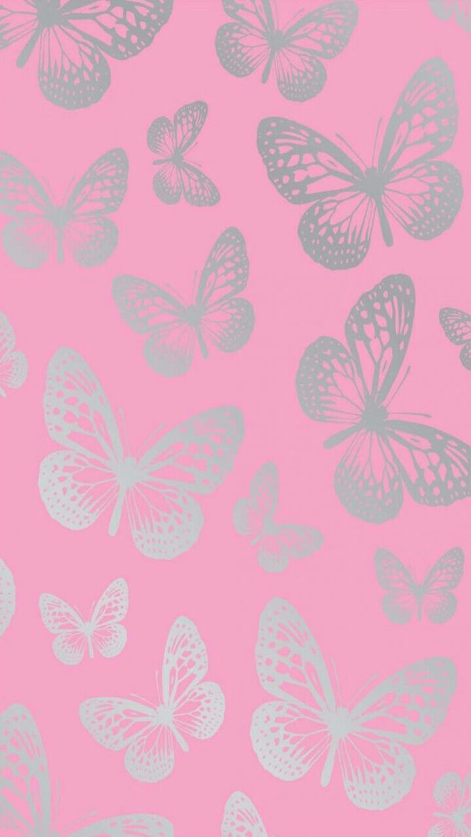 A close up of a pink background with silver butterflies (butterflys, pink, silver)