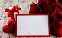 Regalo del Día de San Valentín: Rosas rojas, corazón y tarjeta en blanco