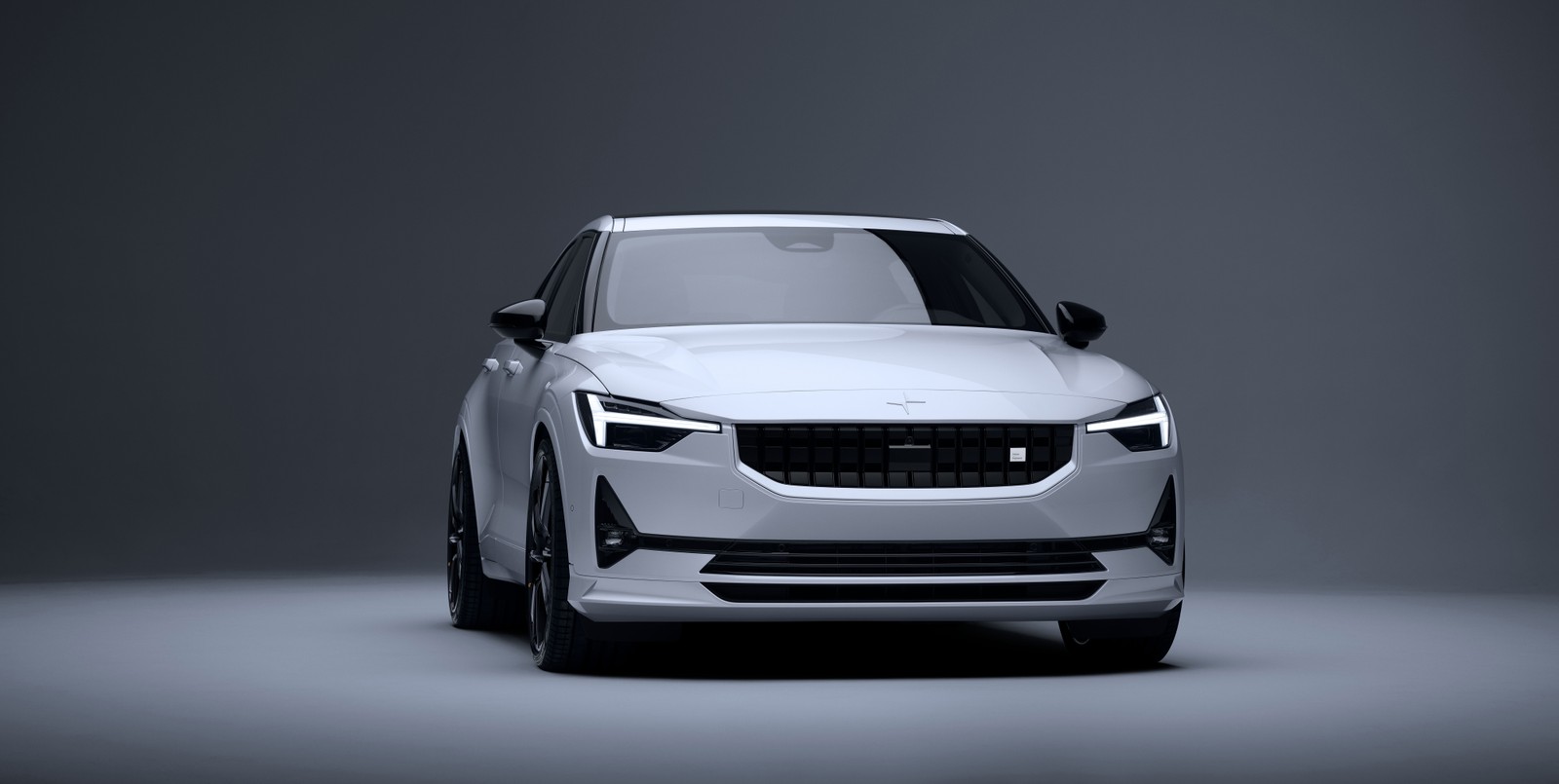 Ein weißes auto in einem studio mit grauem hintergrund (polestar 2 bst edition 270, leistung ev, elektroautos, 2022, 5k)