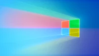 Logo colorido de Windows 10 con fondo de degradado brillante