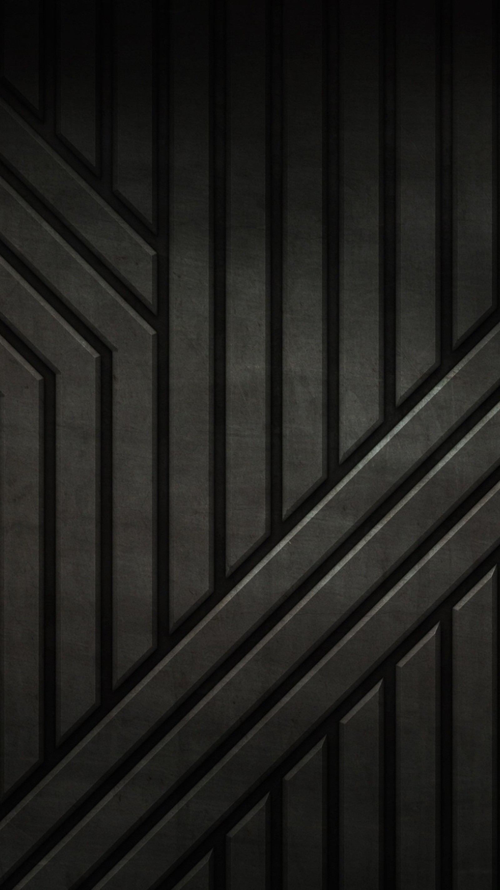 A close up of a black wall with a black and white pattern (black, metal, pattern, steel, texture)