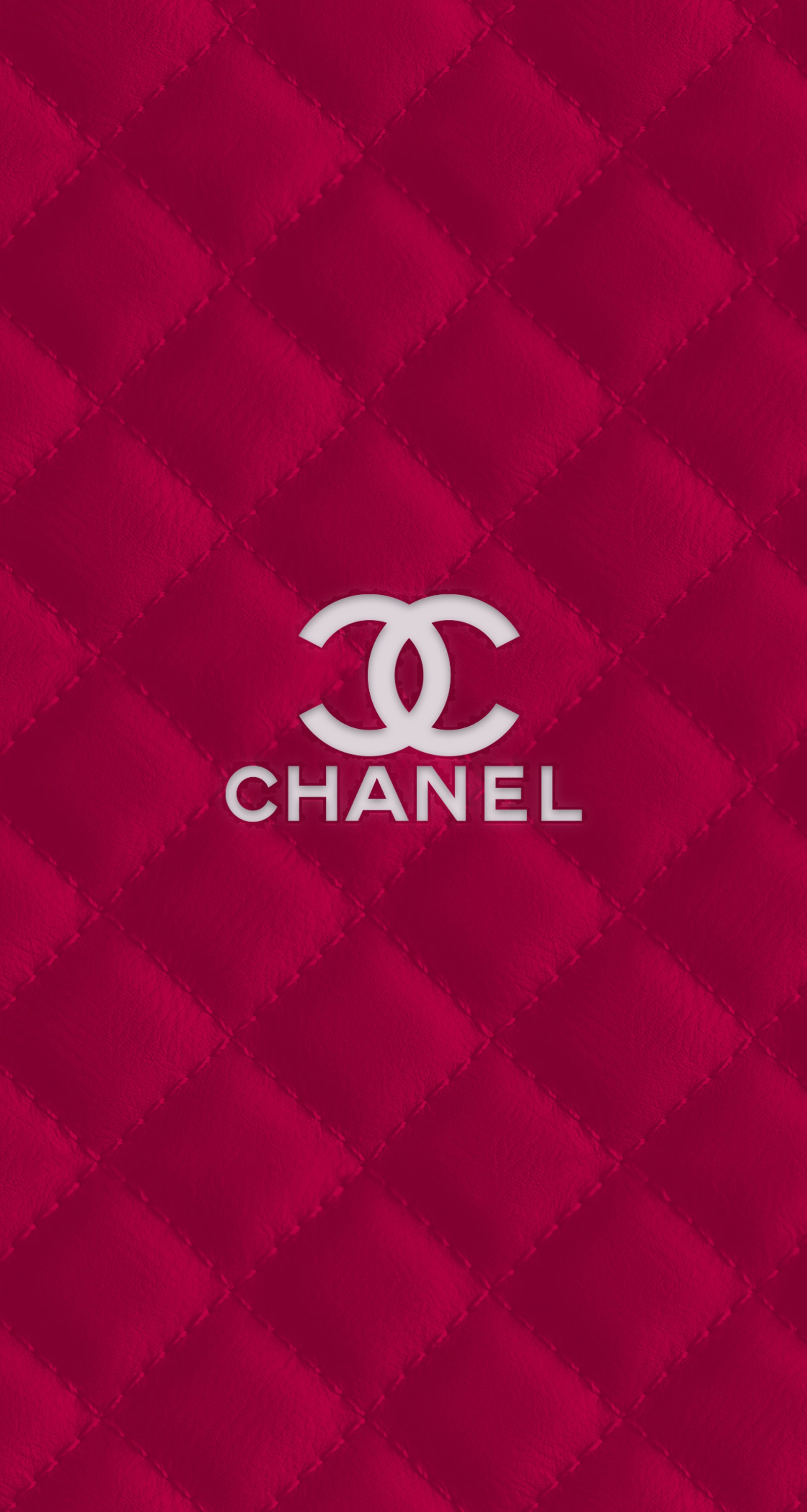 A close up of a red wallpaper with a chanel logo (929, chanel, designer, famous, label)