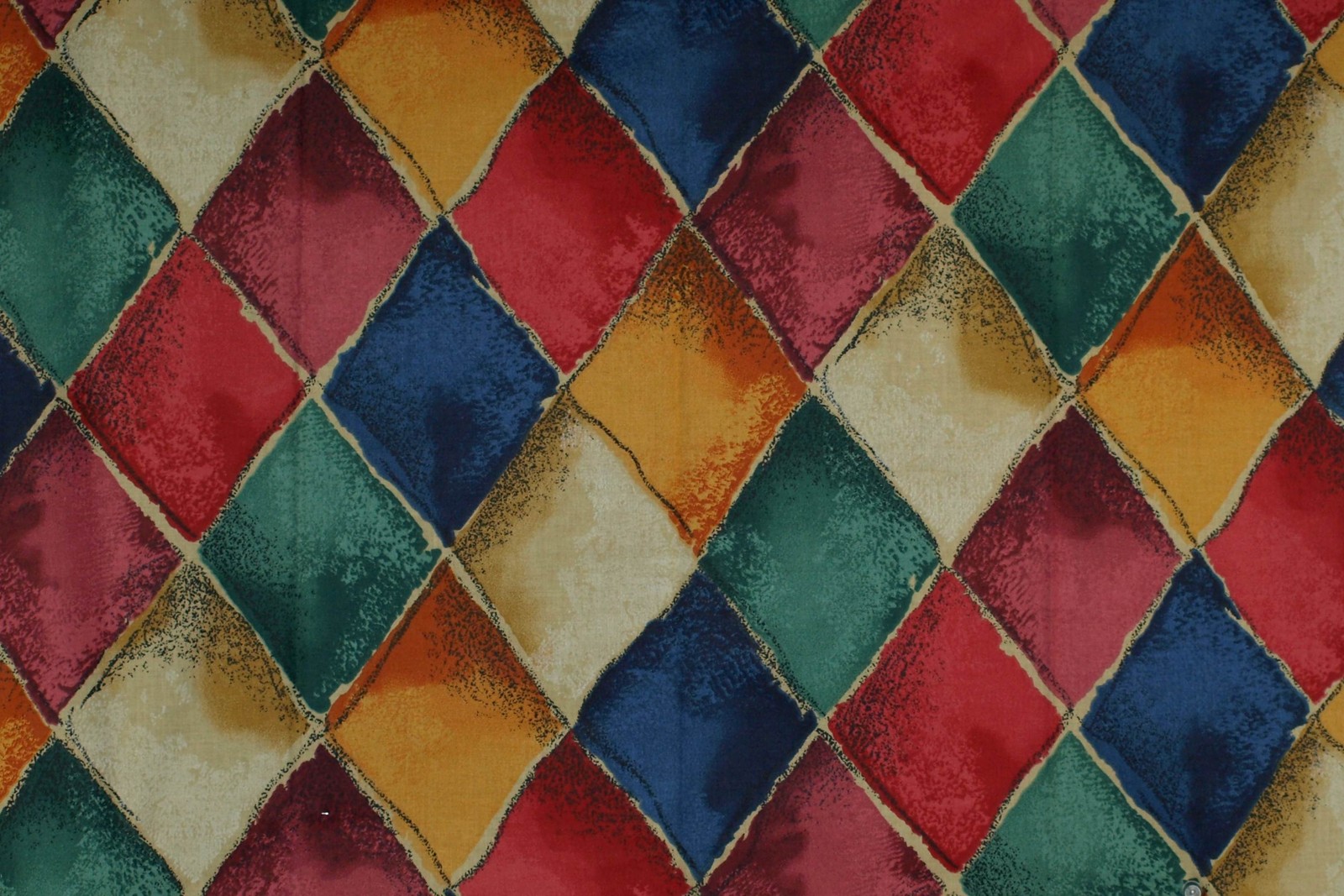 A close up of a colorful quilt with a pattern of squares (pattern, texture, textile, design, symmetry)