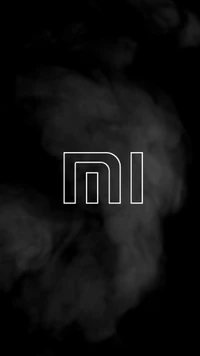 Logotipo minimalista de Xiaomi sobre un fondo oscuro