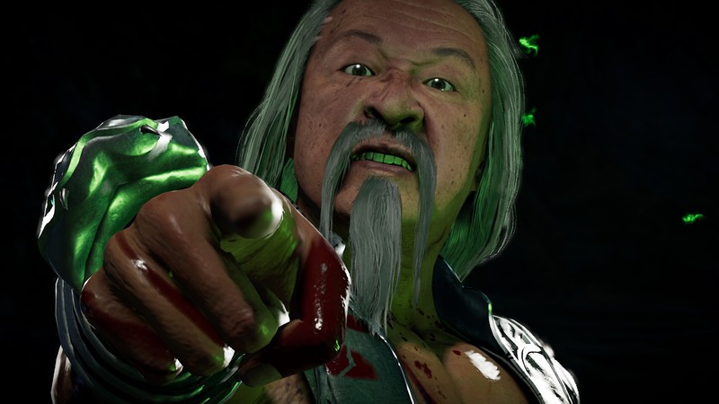 Крупный план человека с ножом в руке (шанг цунг, shang tsung, mortal kombat 11, видеоигра)