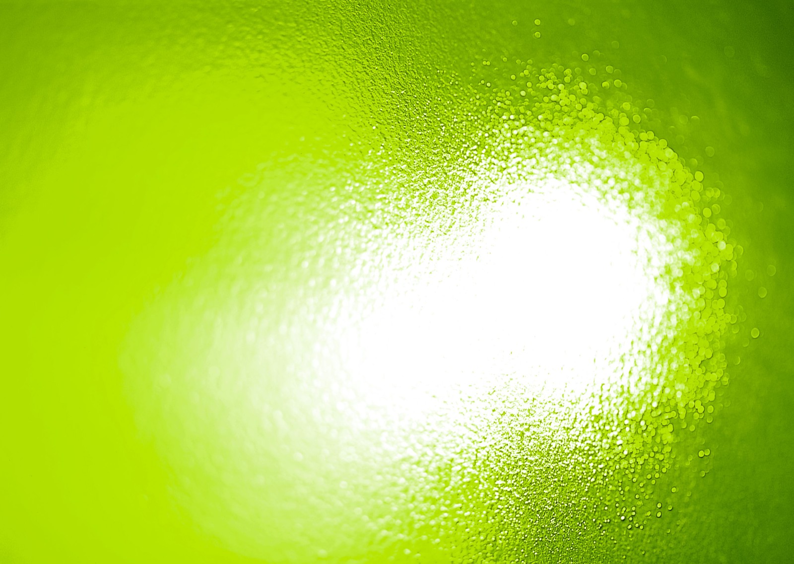 There is a green background with a light shining through it (light, green, yellow)