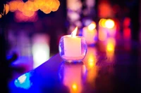 Vibrant Candlelight: A Cobalt Blue and Violet Atmosphere