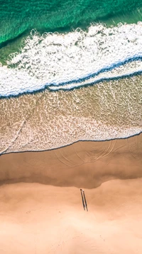 Tranquil Beach Scene with Gentle Waves and Stretching Sands