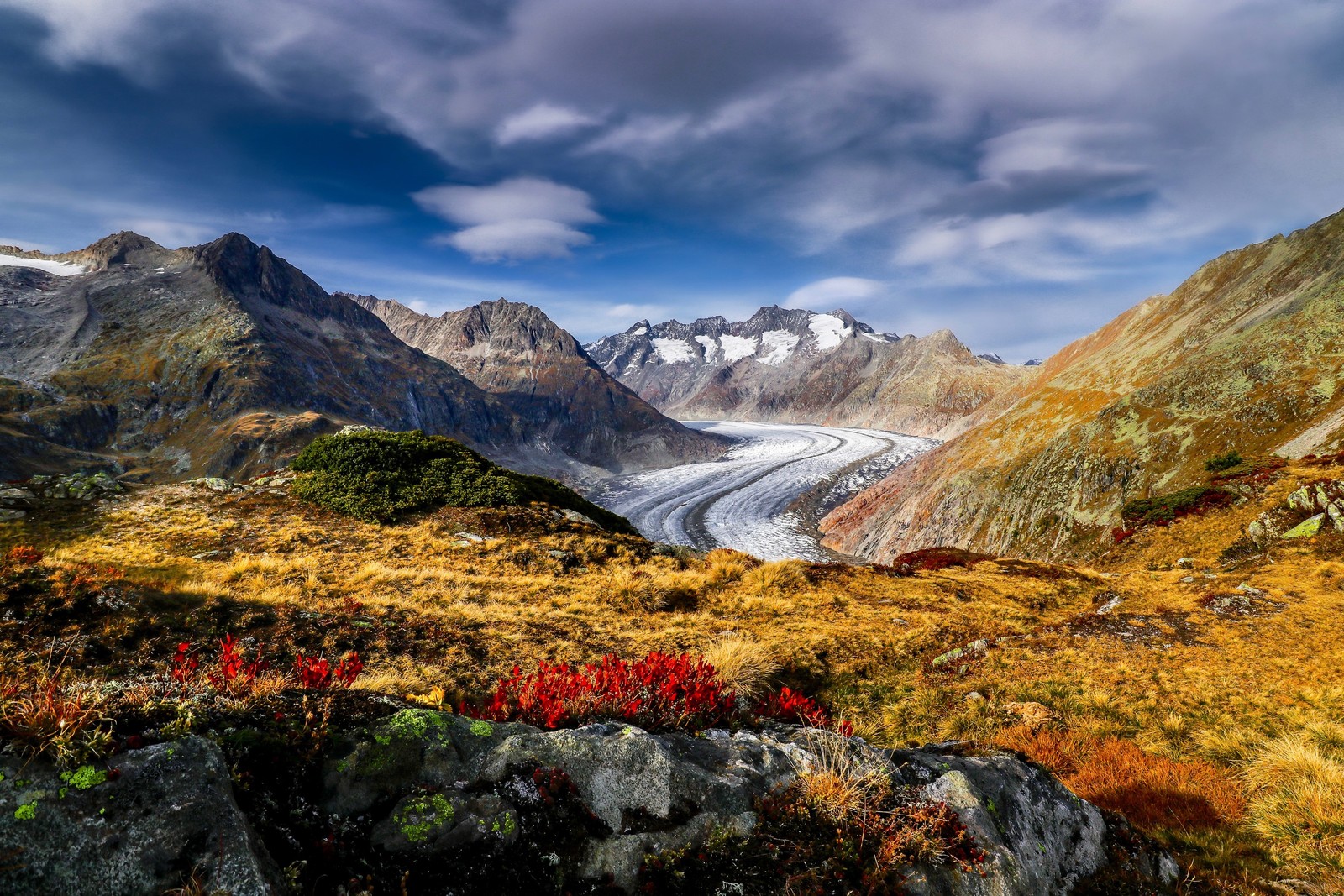 A view of a mountain range with a glacier in the distance (aletsch glacier, alps mountains, mountain pass, landscape, scenery)