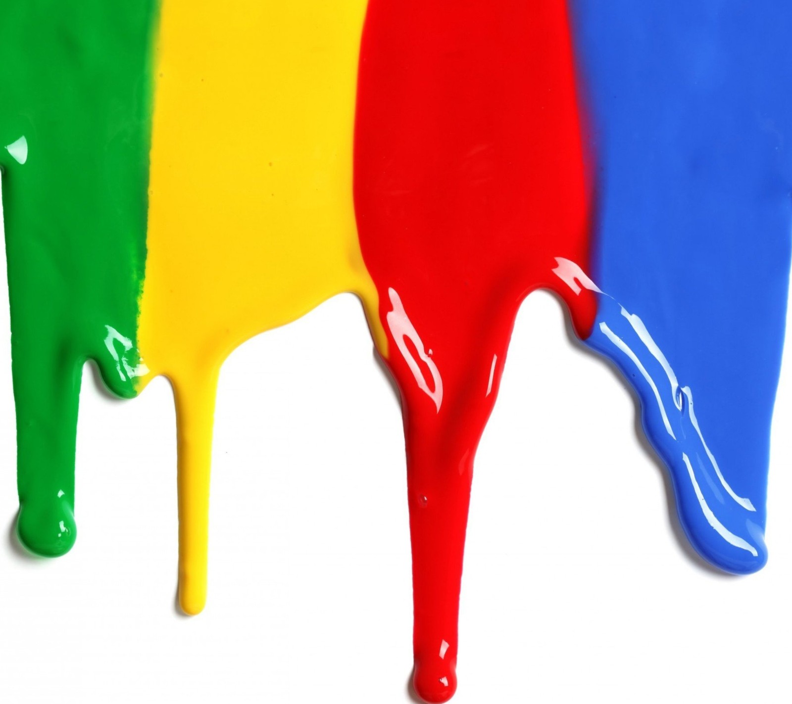 A close up of a row of paint dripping down a white wall (blue, colors, green, liquid, red)