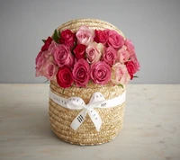 Elegant Bouquet of Pink Roses in a Woven Basket