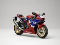 2022 Honda CBR1000RR-R Fireblade SP: A Stunning Sports Bike in Bold Red and Blue Design