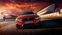 BMW M3 Coupé dynamique dans un cadre de coucher de soleil audacieux