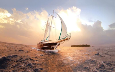 Sailing yacht gliding through calm waters at sunset, with an island silhouette in the background.