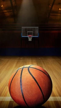 Basketball on Court with Hoop in Background