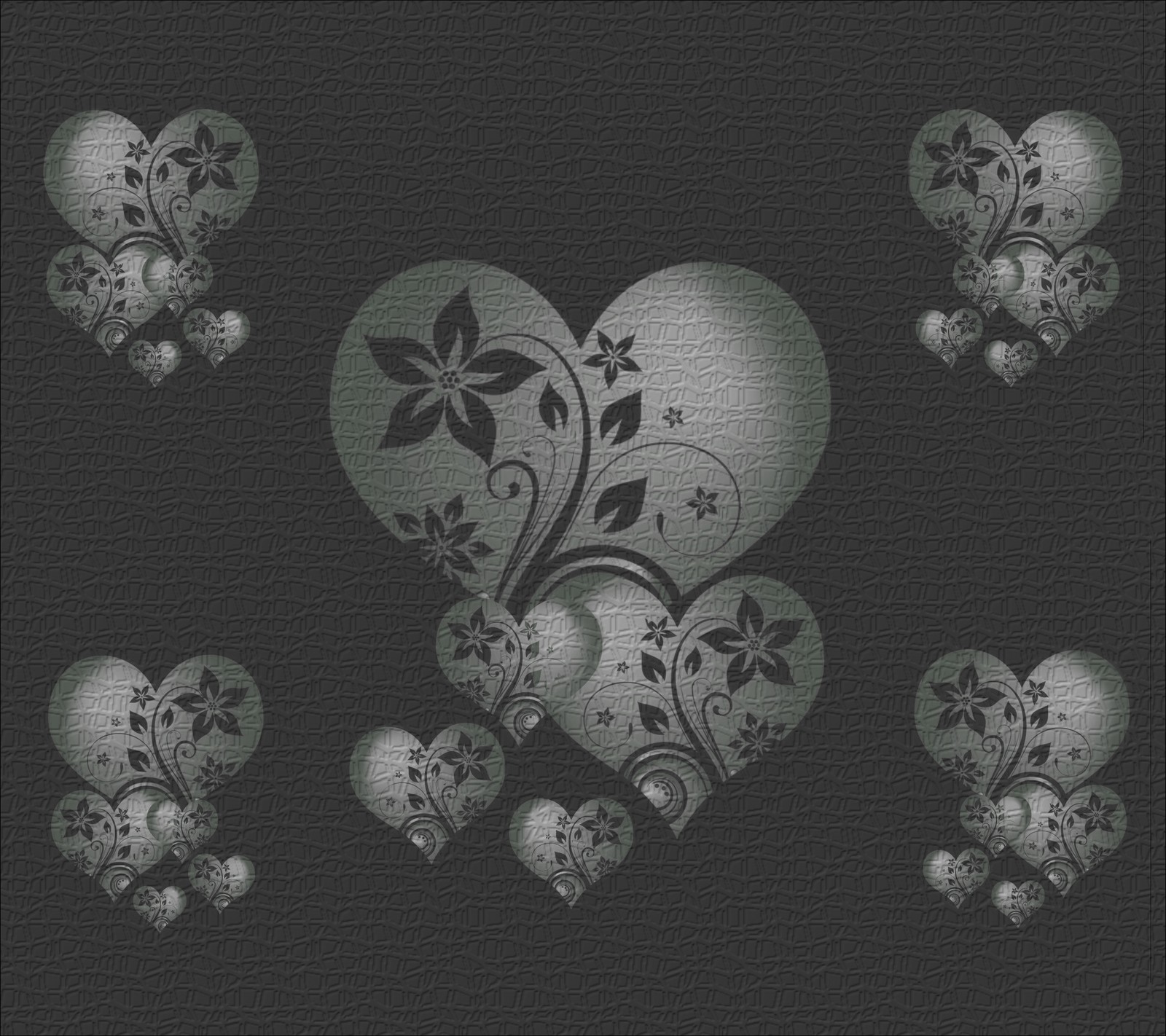 A close up of a heart with flowers and hearts on a black background (hearts, holiday, valentine)