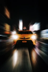 Dynamic Night Drive: Toyota Hatchback in New York