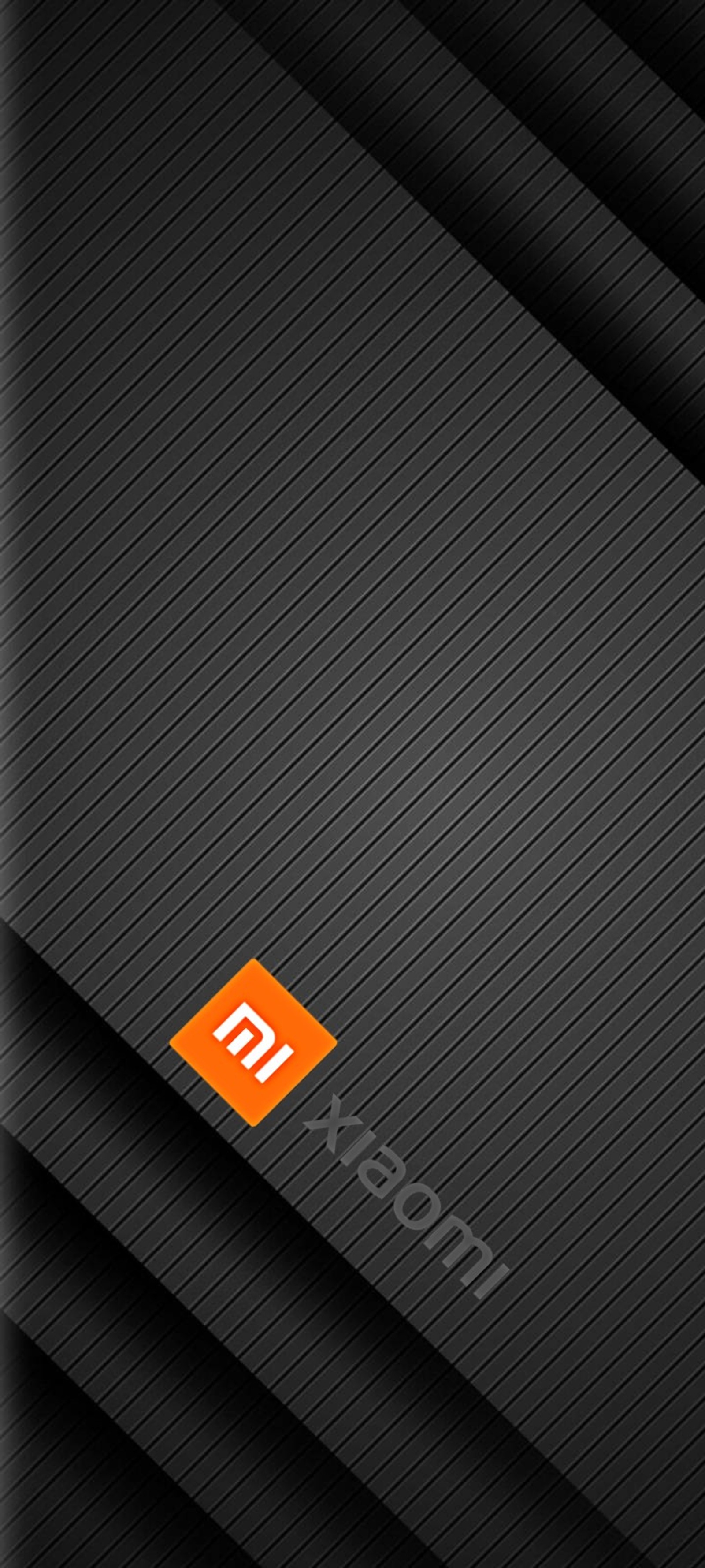 A close up of a black and orange wallpaper with a red logo (black, xiaomi)