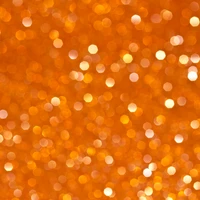 Warm Orange Bokeh with Circular Light Patterns