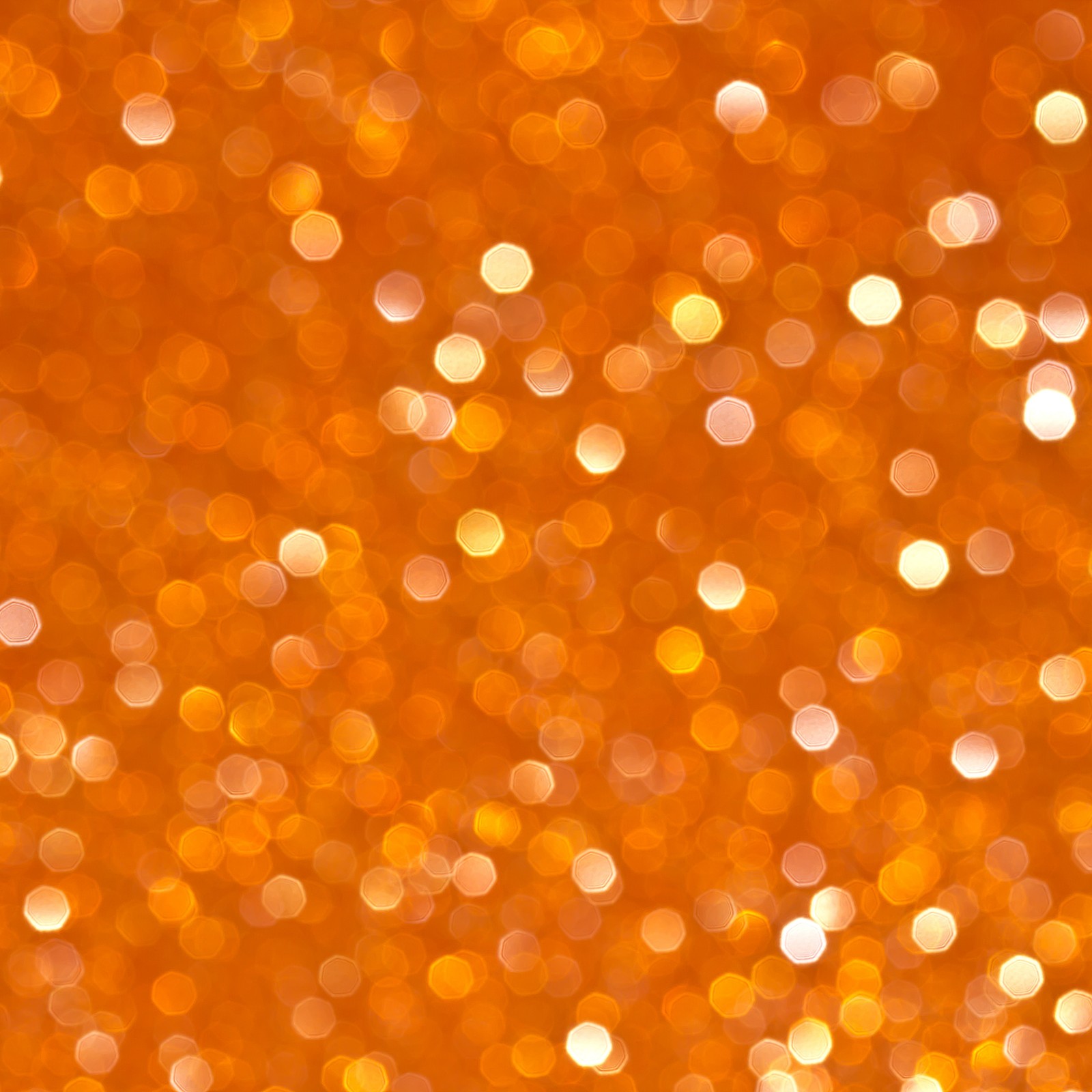 Un primer plano de un fondo amarillo y blanco con muchos círculos (naranja, bokeh, amarillo, patrón, círculo)