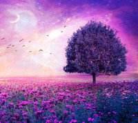 Majestuoso árbol rosa en un paisaje de lavanda de ensueño