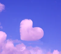 Nuage en forme de cœur dans un ciel rose rêveur