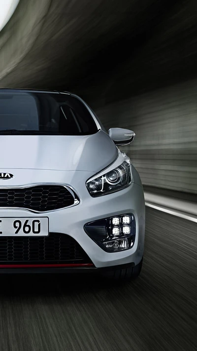 Sleek and Sporty White Kia Ceed in Motion